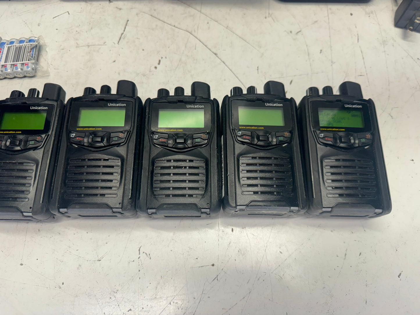 8 Unication G1 UHF Pagers 450-470 MHz w/ Programming Cradle