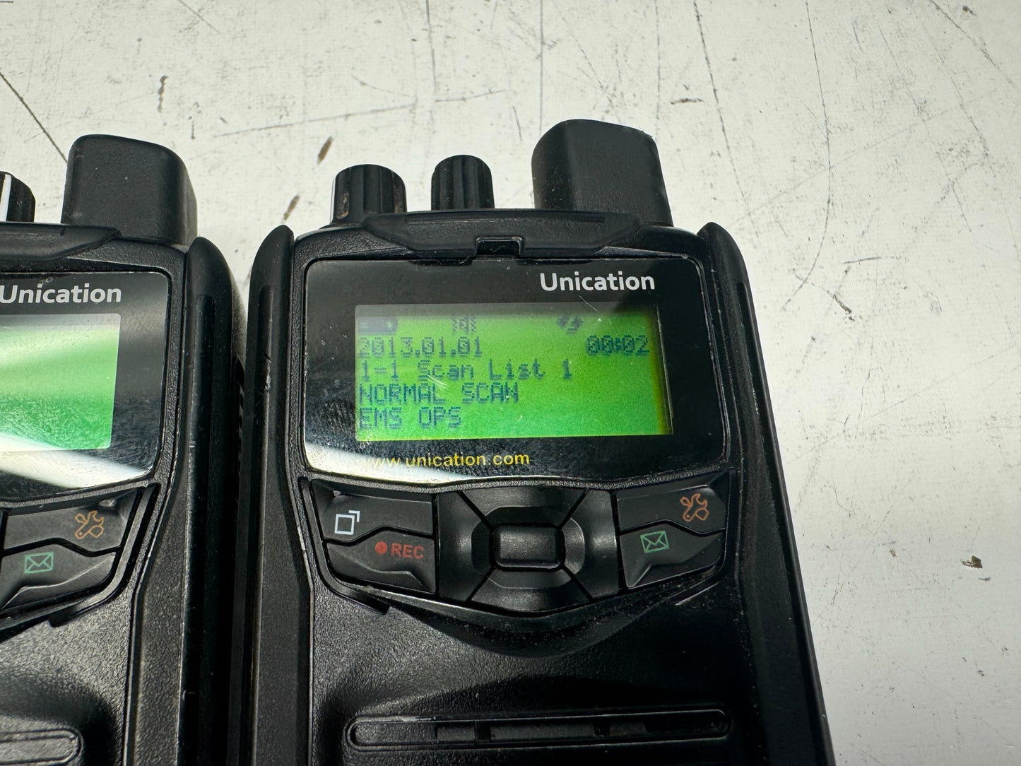 8 Unication G1 UHF Pagers 450-470 MHz w/ Programming Cradle