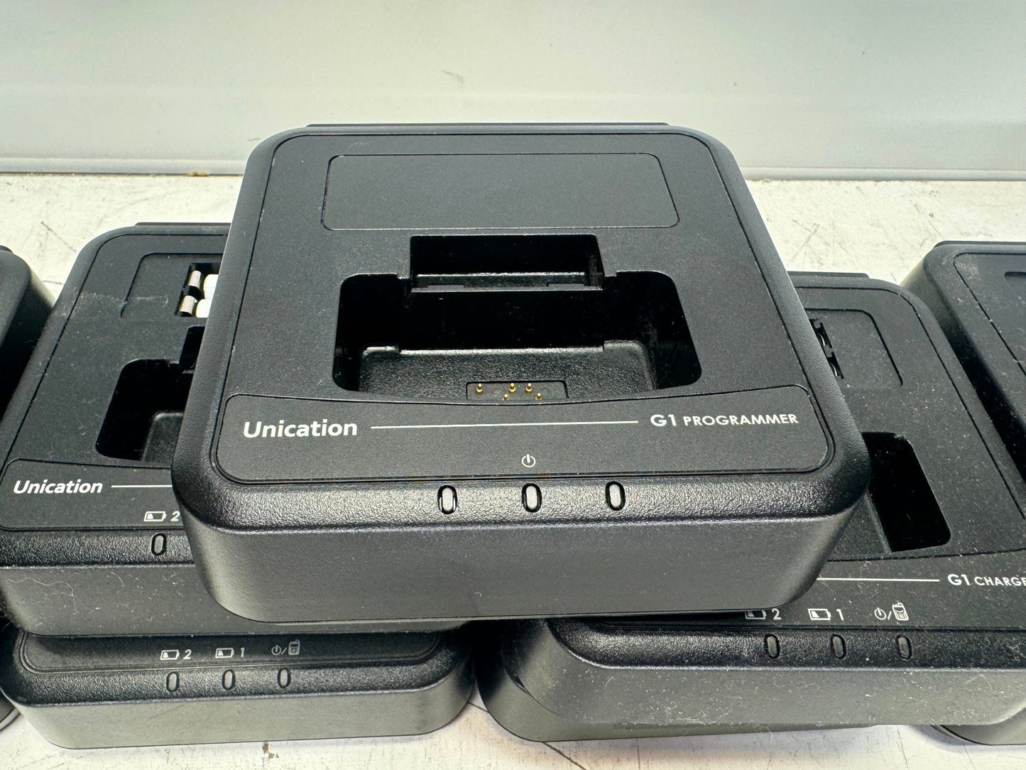 8 Unication G1 UHF Pagers 450-470 MHz w/ Programming Cradle